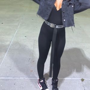 Black bodysuit, very tight and stretchy